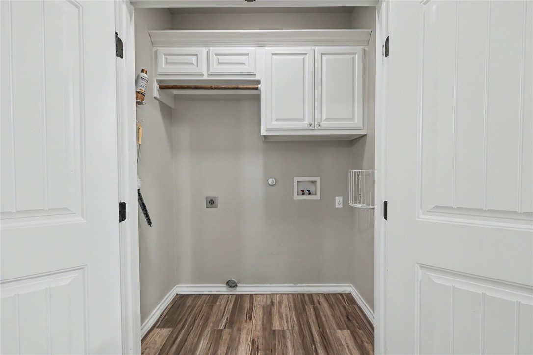 302 Cooper Road, Unit E2 Odem, TX 78370 - Photo 24 of 24 a view of a kitchen with cabinets