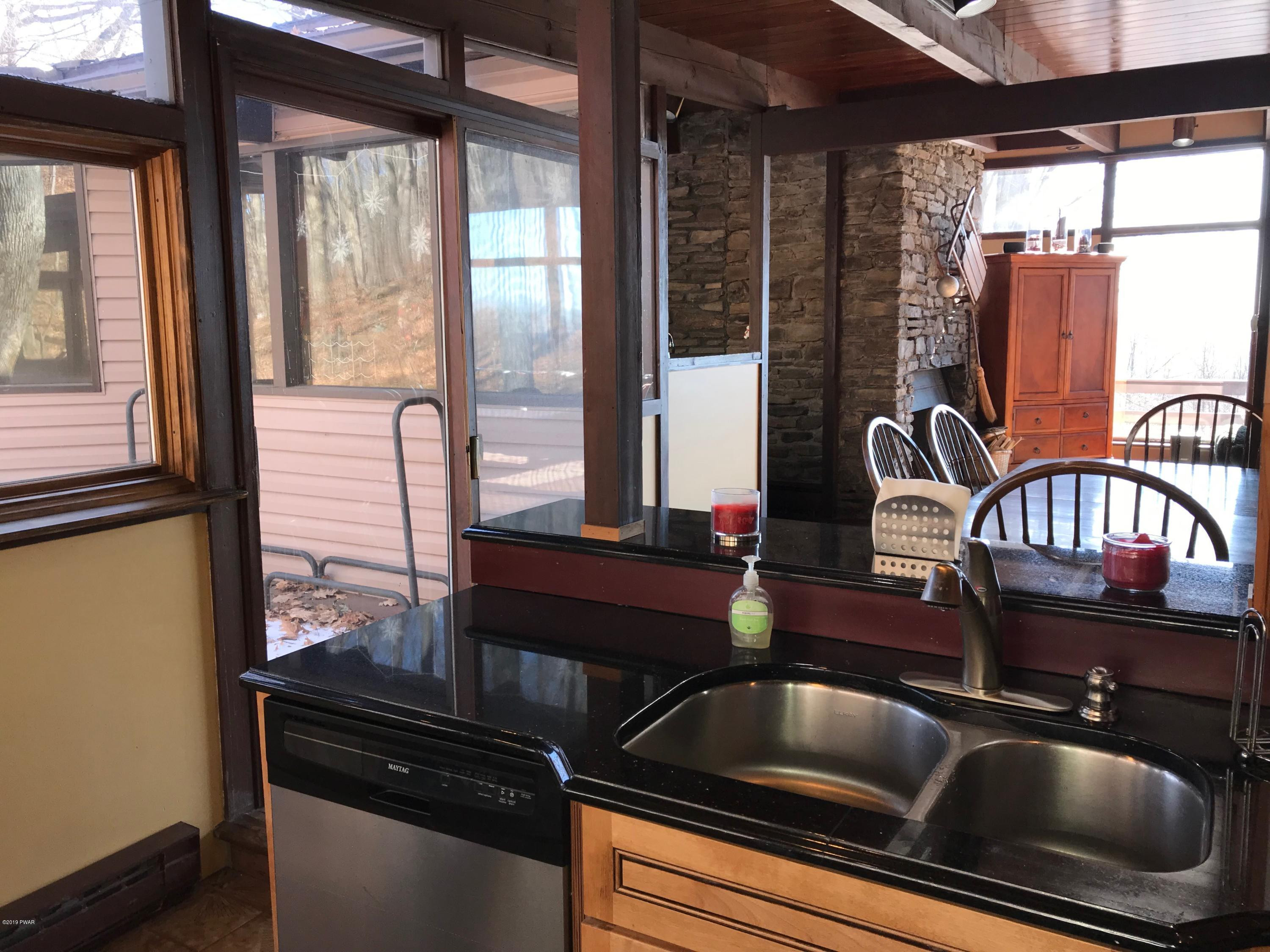 819 Wargo Road Union Dale, PA 18470 - Photo 12 of 49 a kitchen view with a sink and cabinets