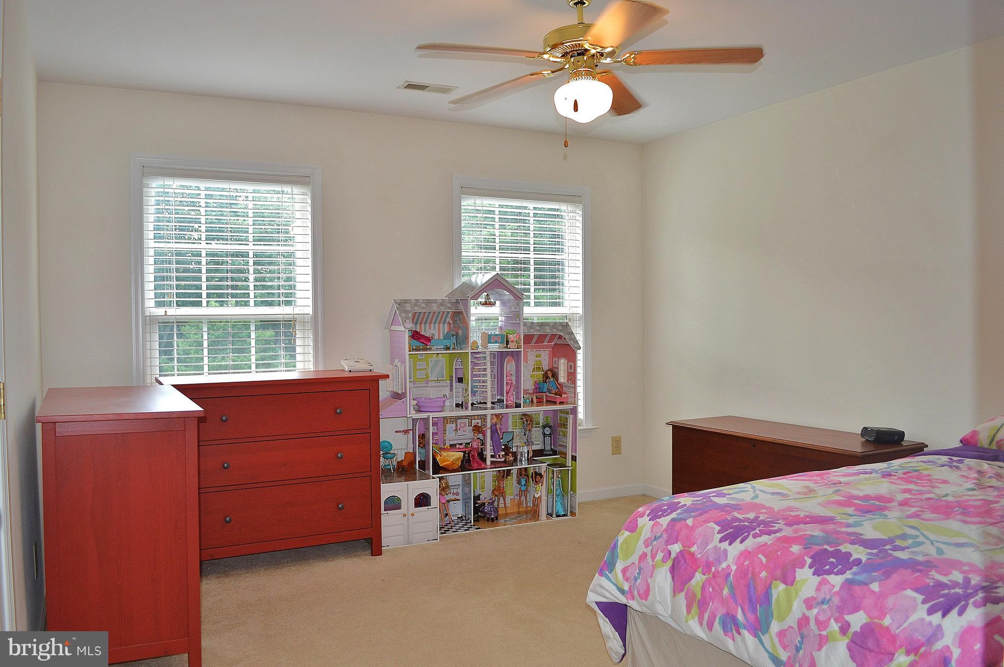 9015 Old Stillhouse Road Rixeyville, VA 22737 - Photo 12 of 21 a bedroom with a bed and a window