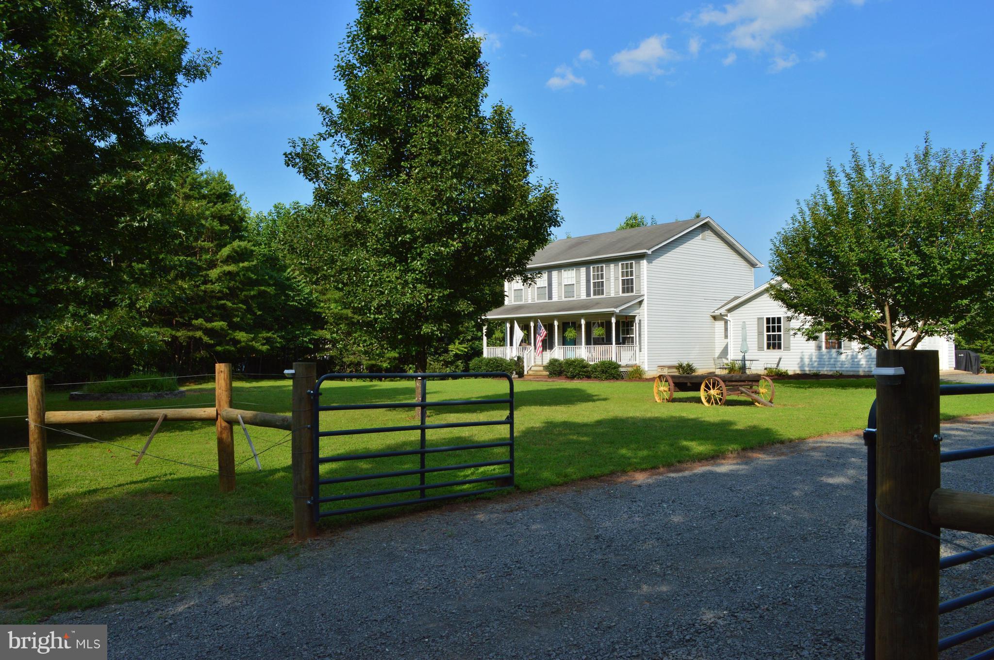 9015 Old Stillhouse Road Rixeyville, VA 22737 - Photo 21 of 21 a front view of a house with a yard