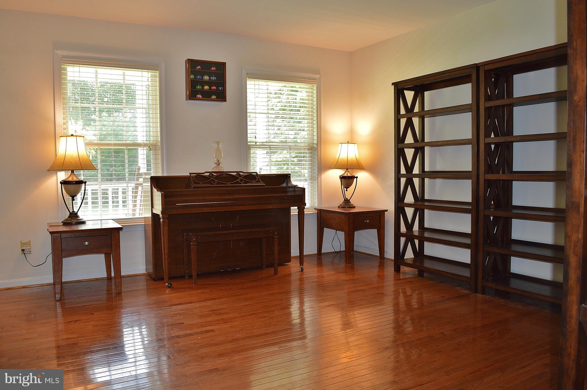 9015 Old Stillhouse Road Rixeyville, VA 22737 - Photo 5 of 21 a living room with furniture and a wooden floor