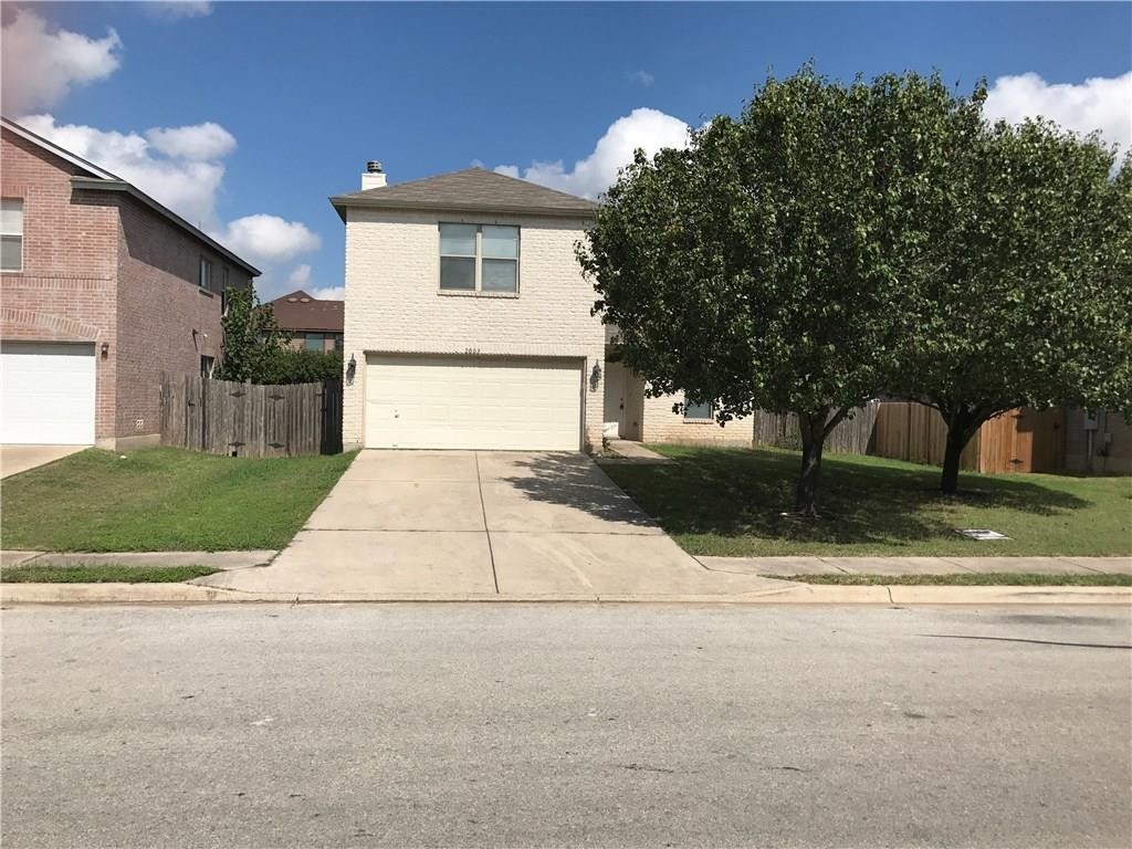 2003 Rim Rock Drive Leander, TX 78641 - Photo 1 of 1 a view of a house with a yard