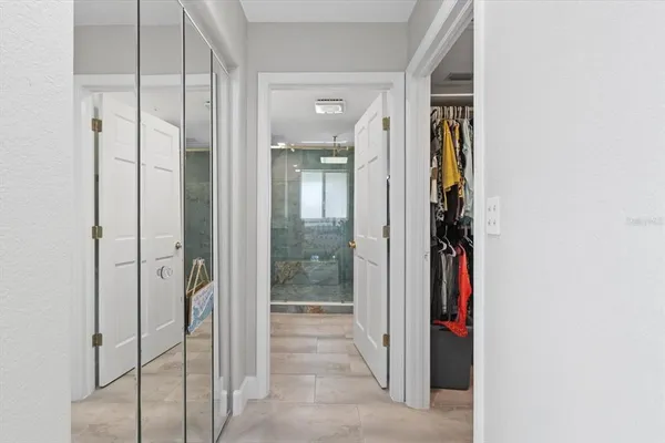a kitchen with sink cabinets and refrigerator