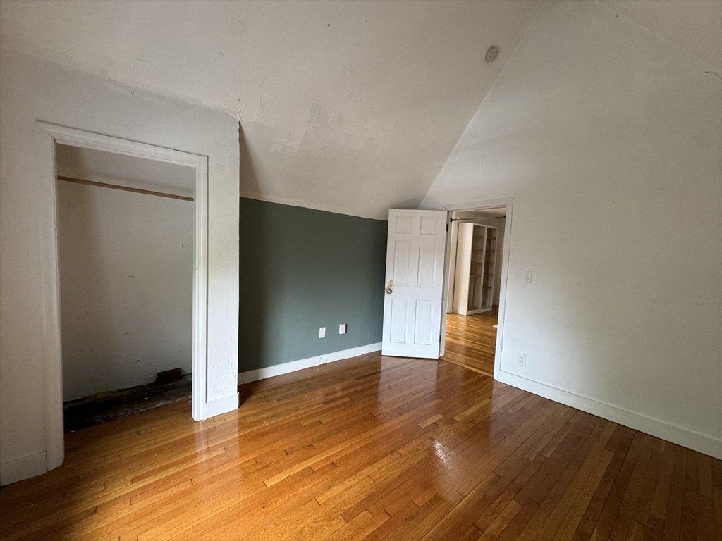 20 South Street, Unit 2 Boston, MA 02135 - Photo 15 of 21 a view of empty room with wooden floor