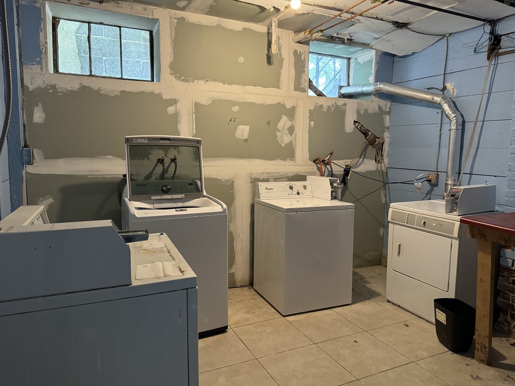 20 South Street, Unit 2 Boston, MA 02135 - Photo 21 of 21 a utility room with dryer and washer