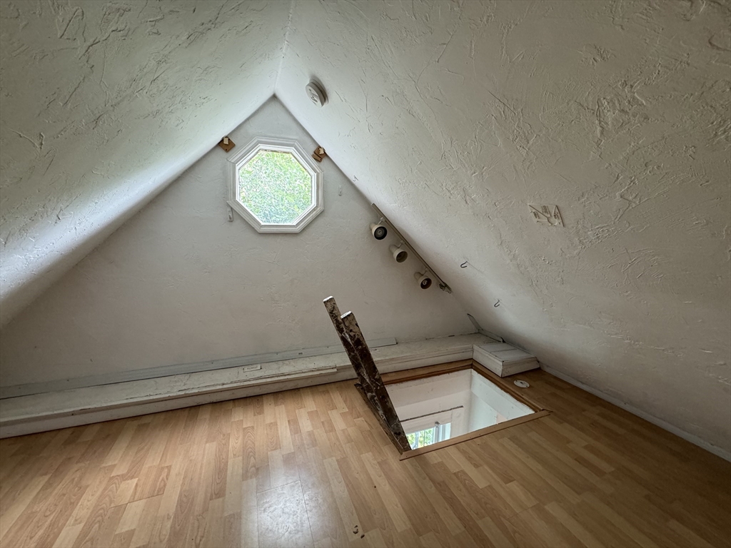 20 South Street, Unit 2 Boston, MA 02135 - Photo 8 of 21 a view of a hallway with wooden floor
