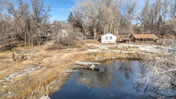 a view of a backyard of the house