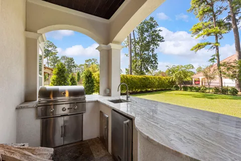 a view of a kitchen with a sink and dishwasher