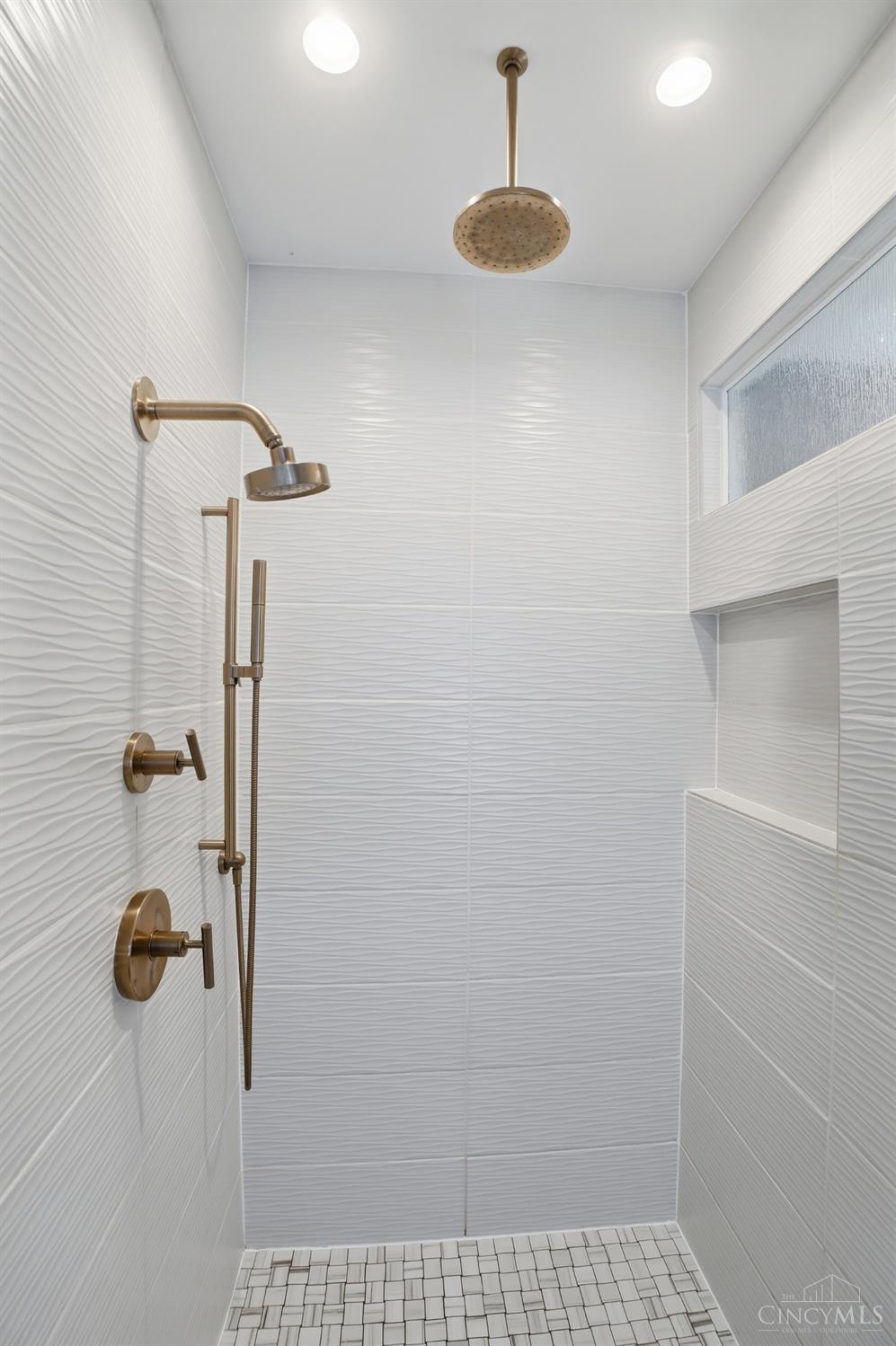 1338 Spring Street Cincinnati, OH 45202 - Photo 21 of 46 The primary bath features a spa-like walk-in shower.