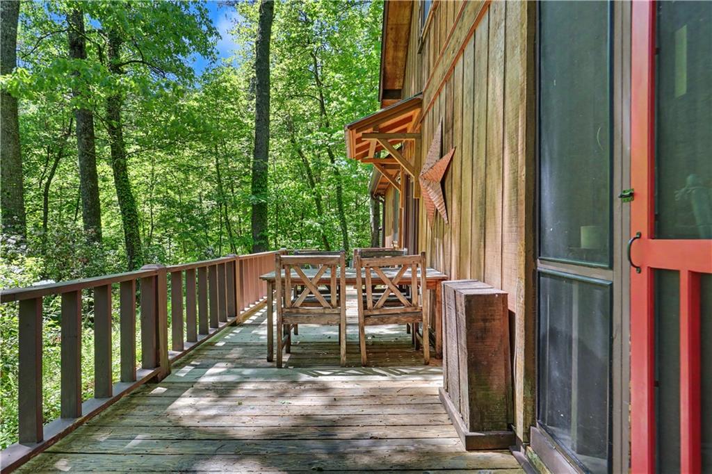102 Moses Road Rabun Gap, GA 30568 - Photo 32 of 40 a view of balcony with furniture