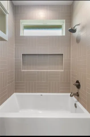 a bathroom with a bathtub