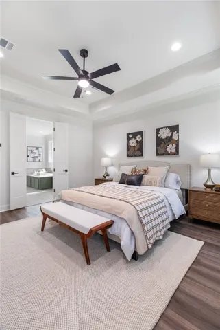 a spacious bathroom with a double vanity sink a mirror and a shower