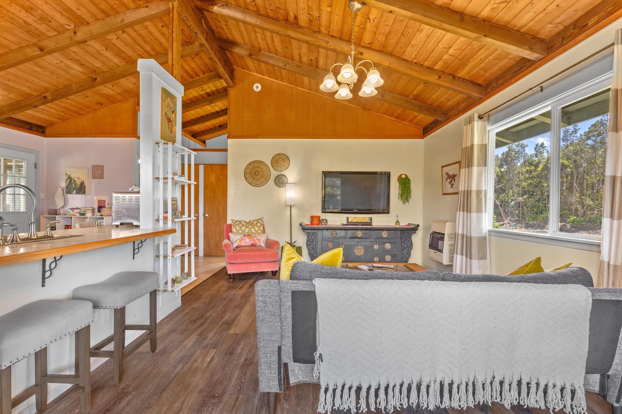 11-3681 Old Volcano Road Volcano, HI 96785 - Photo 2 of 26 a view of a patio with swimming pool table and chairs