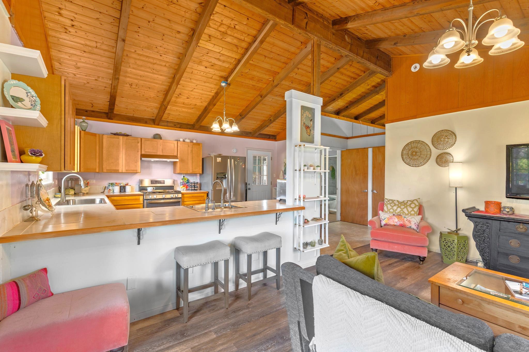 11-3681 Old Volcano Road Volcano, HI 96785 - Photo 5 of 26 a living room with furniture and wooden floor