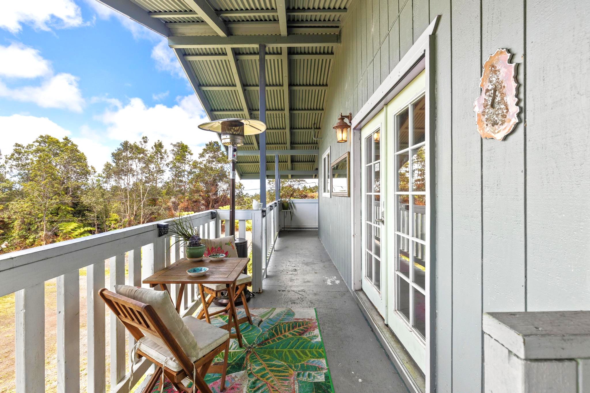 11-3681 Old Volcano Road Volcano, HI 96785 - Photo 9 of 26 a view of a porch with furniture