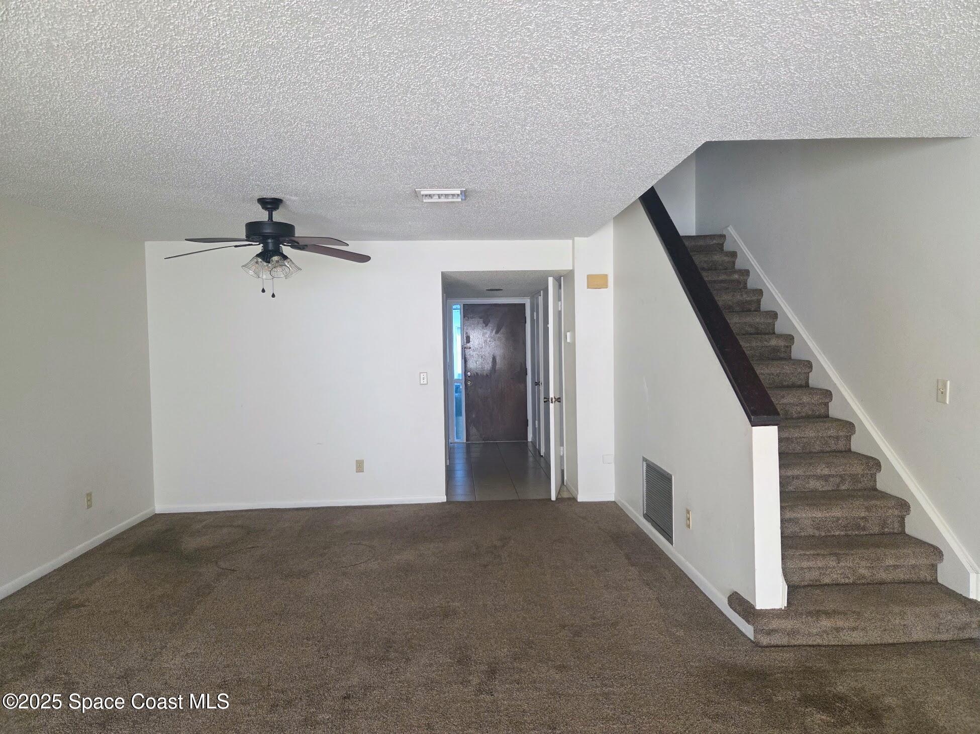 255 Kings Way Satellite Beach, FL 32937 - Photo 13 of 34 a view of a hallway with entryway