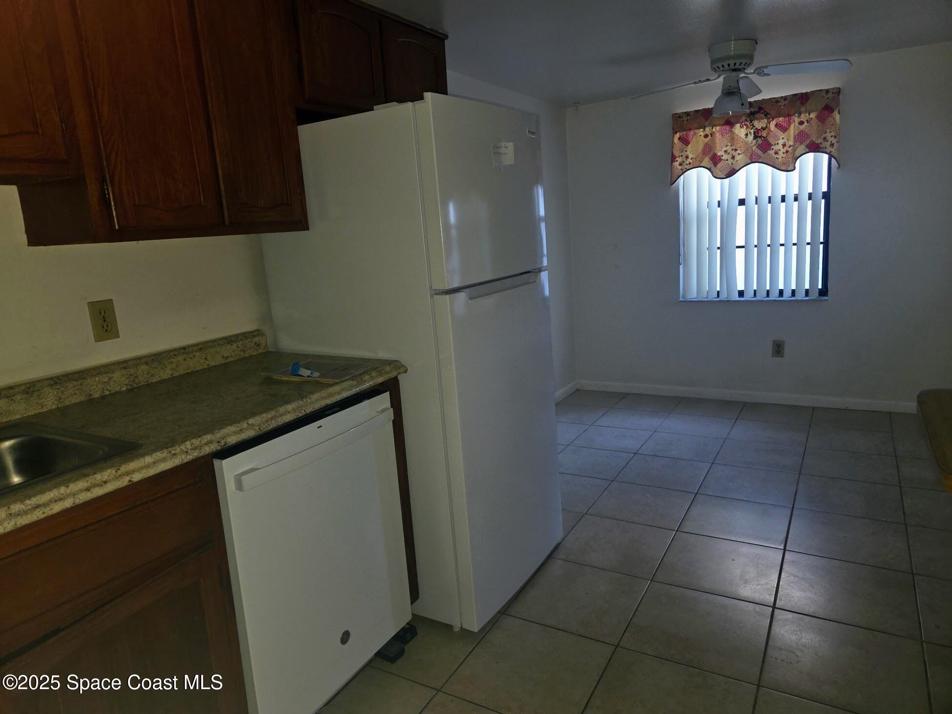 255 Kings Way Satellite Beach, FL 32937 - Photo 18 of 34 a utility room with washer and dryer