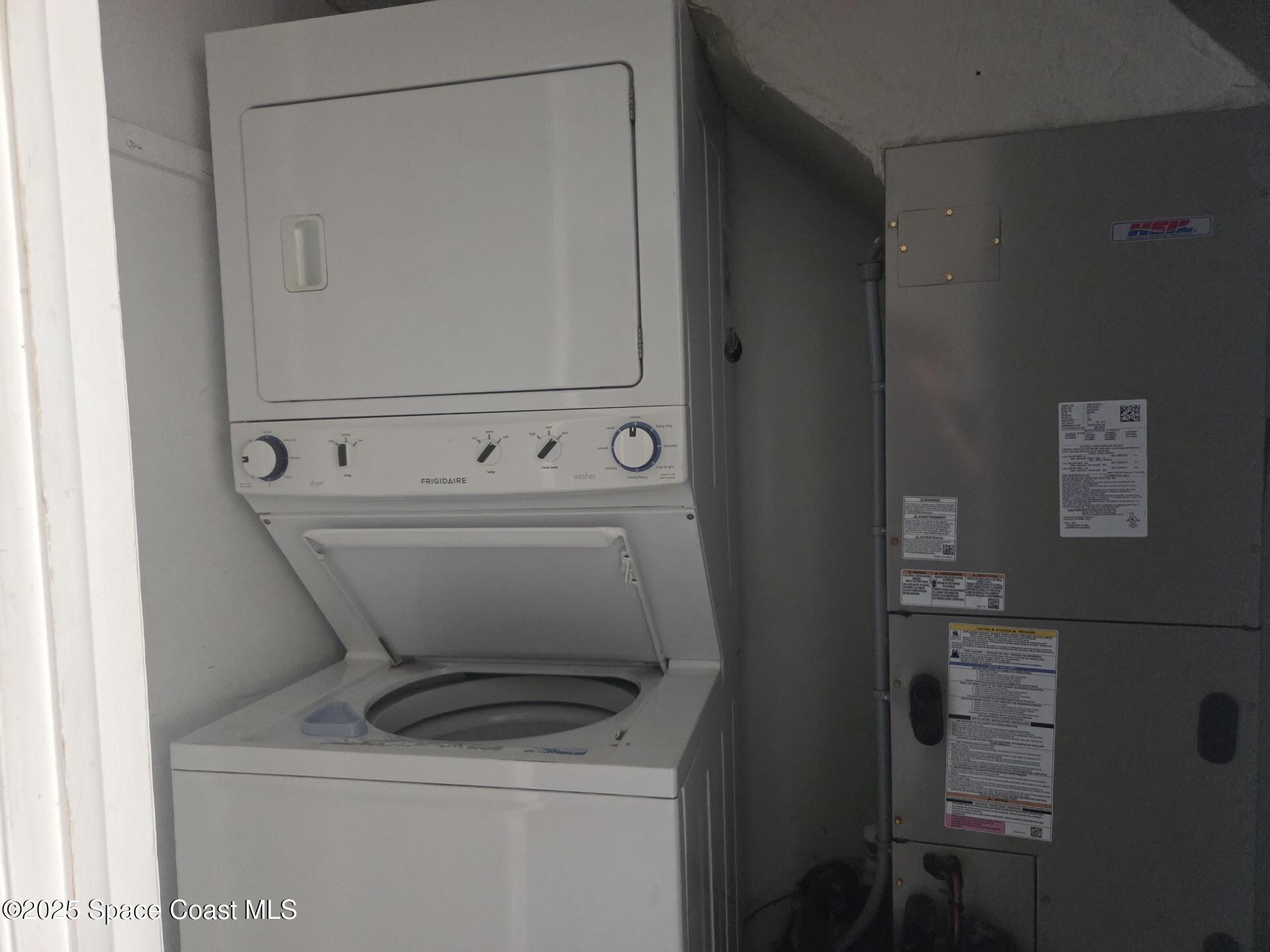 255 Kings Way Satellite Beach, FL 32937 - Photo 27 of 34 a utility room with dryer and washer