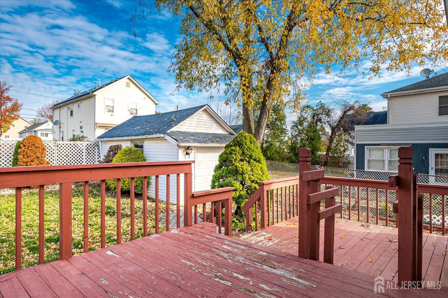 98 Trieste Street Iselin, NJ 08830 - Photo 28 of 30 a balcony with wooden floor and outdoor seating