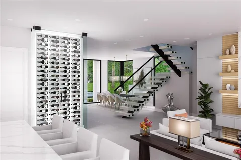 a picture of a room with a white wall and a large window