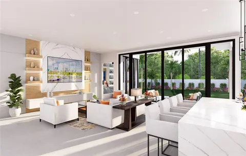 an aerial view of a house with a yard and large trees