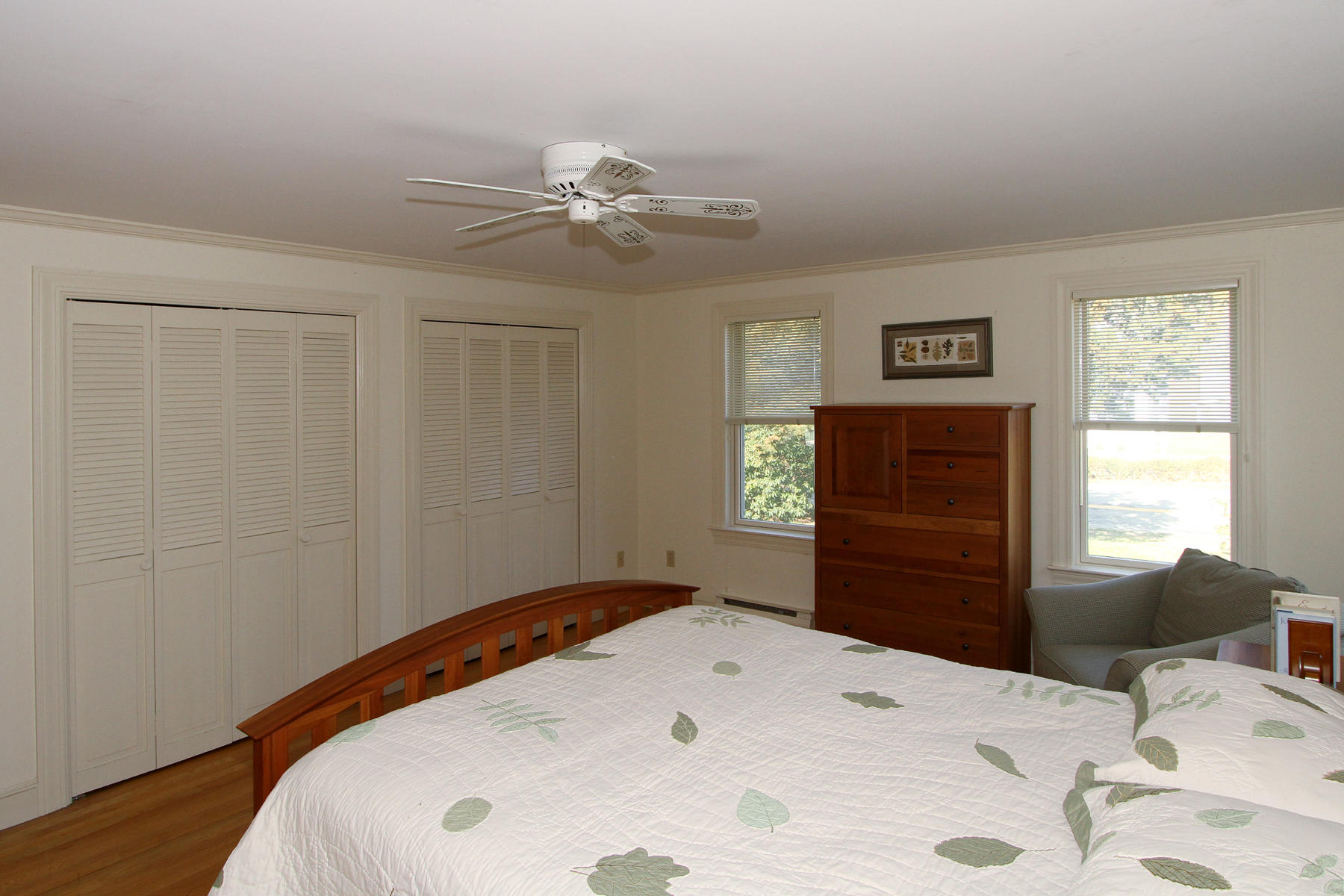45 Doane Road Harwich Port, MA 02646 - Photo 14 of 35 a bedroom with a bed and a dresser