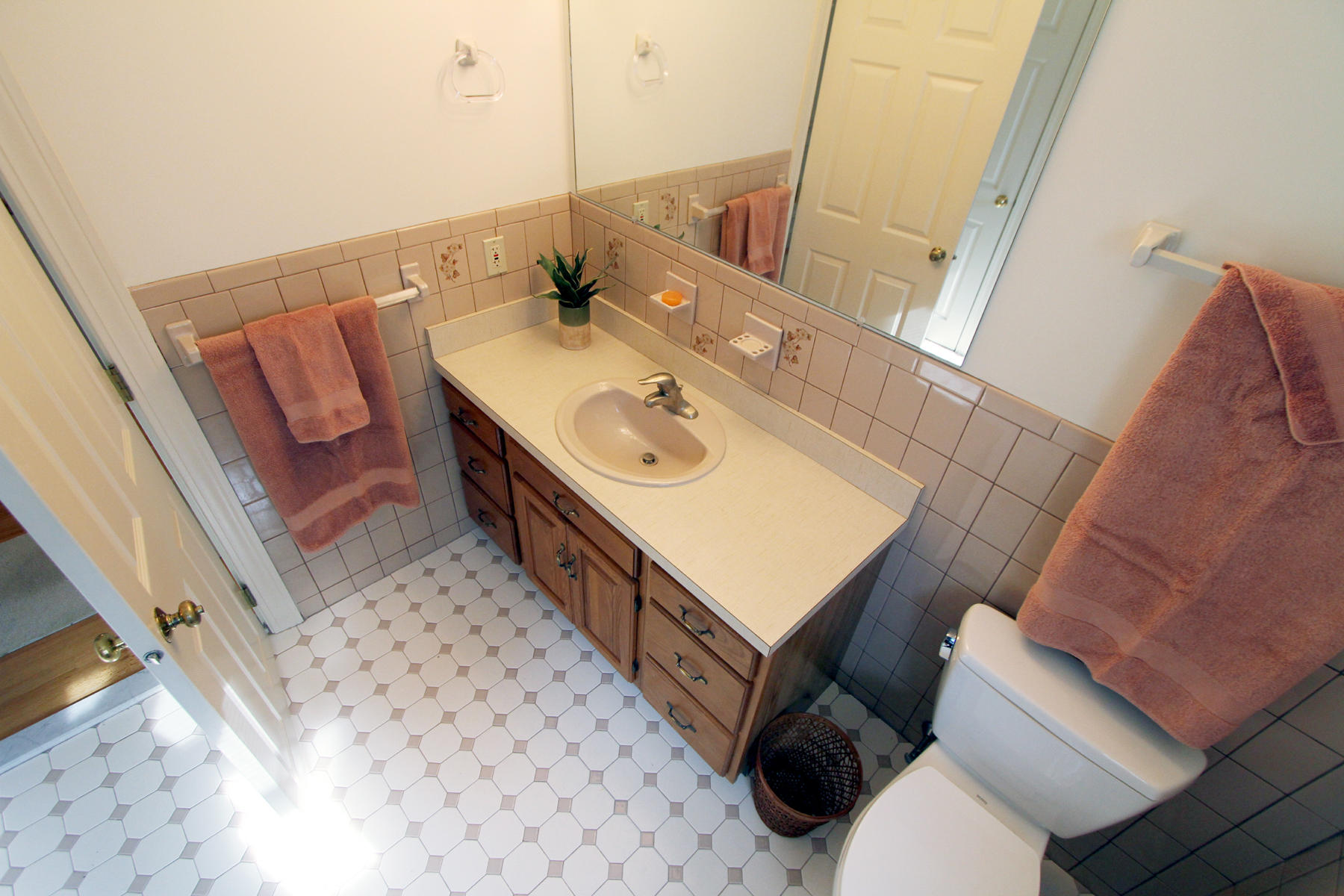 45 Doane Road Harwich Port, MA 02646 - Photo 21 of 35 a bathroom with a sink mirror and vanity