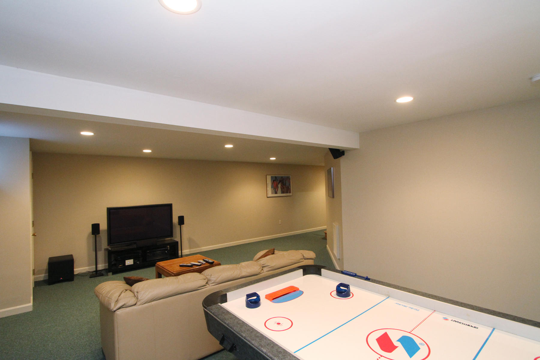 45 Doane Road Harwich Port, MA 02646 - Photo 24 of 35 a room with furniture and a flat screen tv