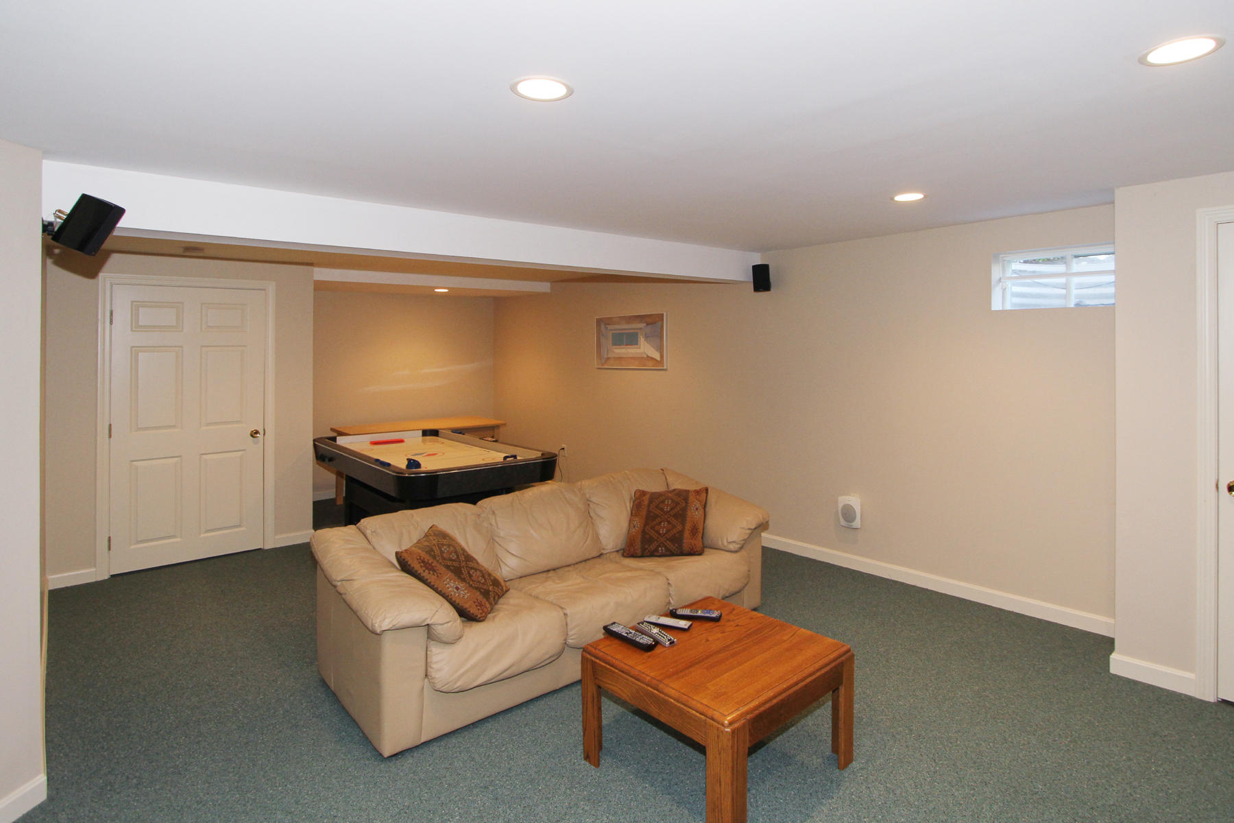45 Doane Road Harwich Port, MA 02646 - Photo 25 of 35 a living room with furniture and a table