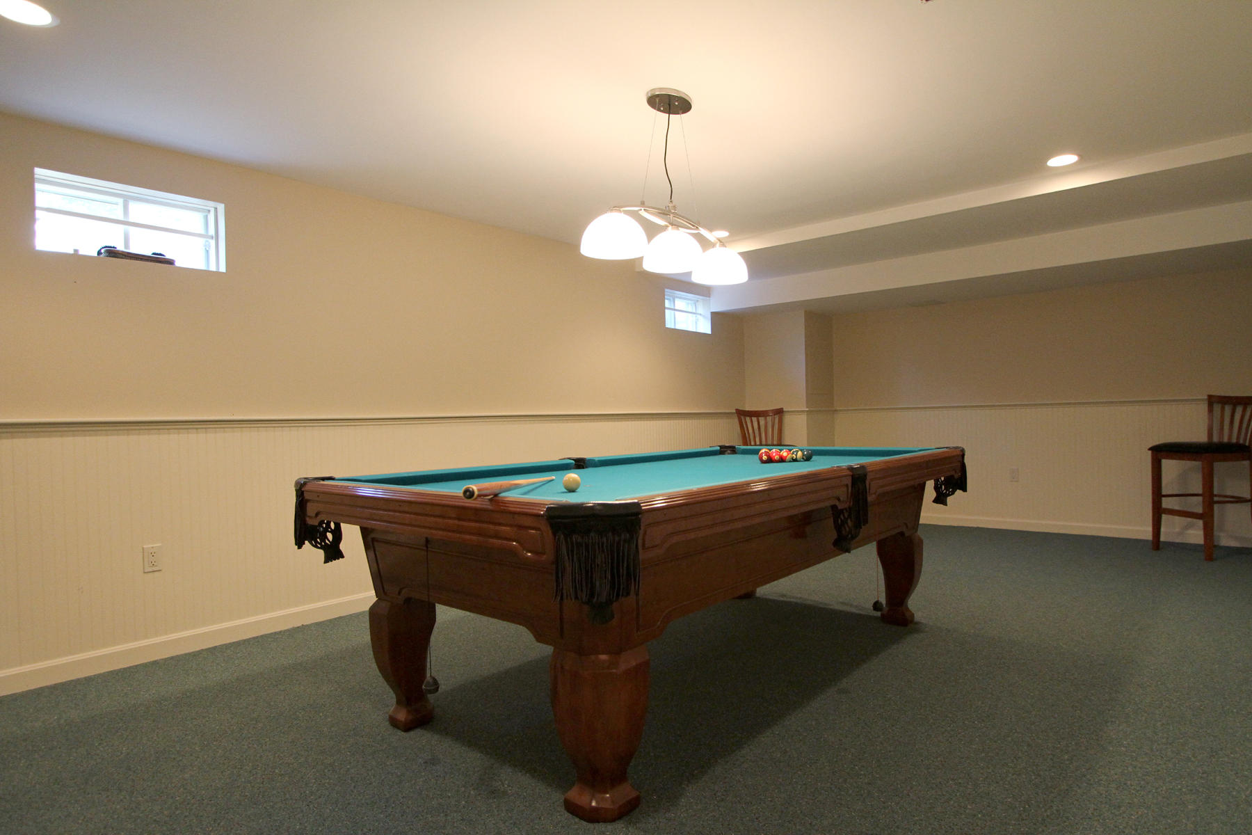 45 Doane Road Harwich Port, MA 02646 - Photo 26 of 35 a room with table chairs and wooden floor