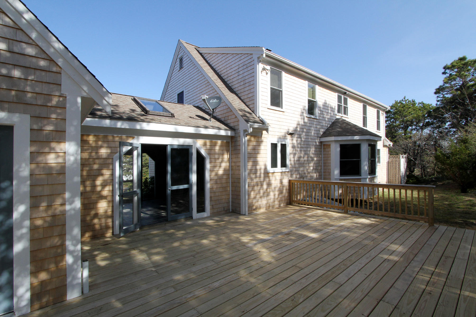 45 Doane Road Harwich Port, MA 02646 - Photo 29 of 35 a front view of a house with a porch