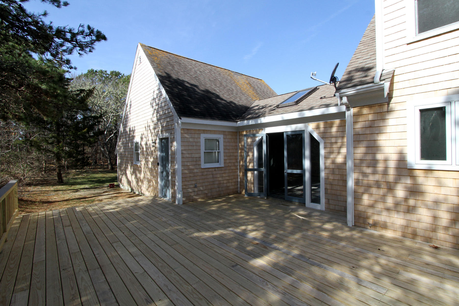 45 Doane Road Harwich Port, MA 02646 - Photo 31 of 35 a view of a house with wooden floor