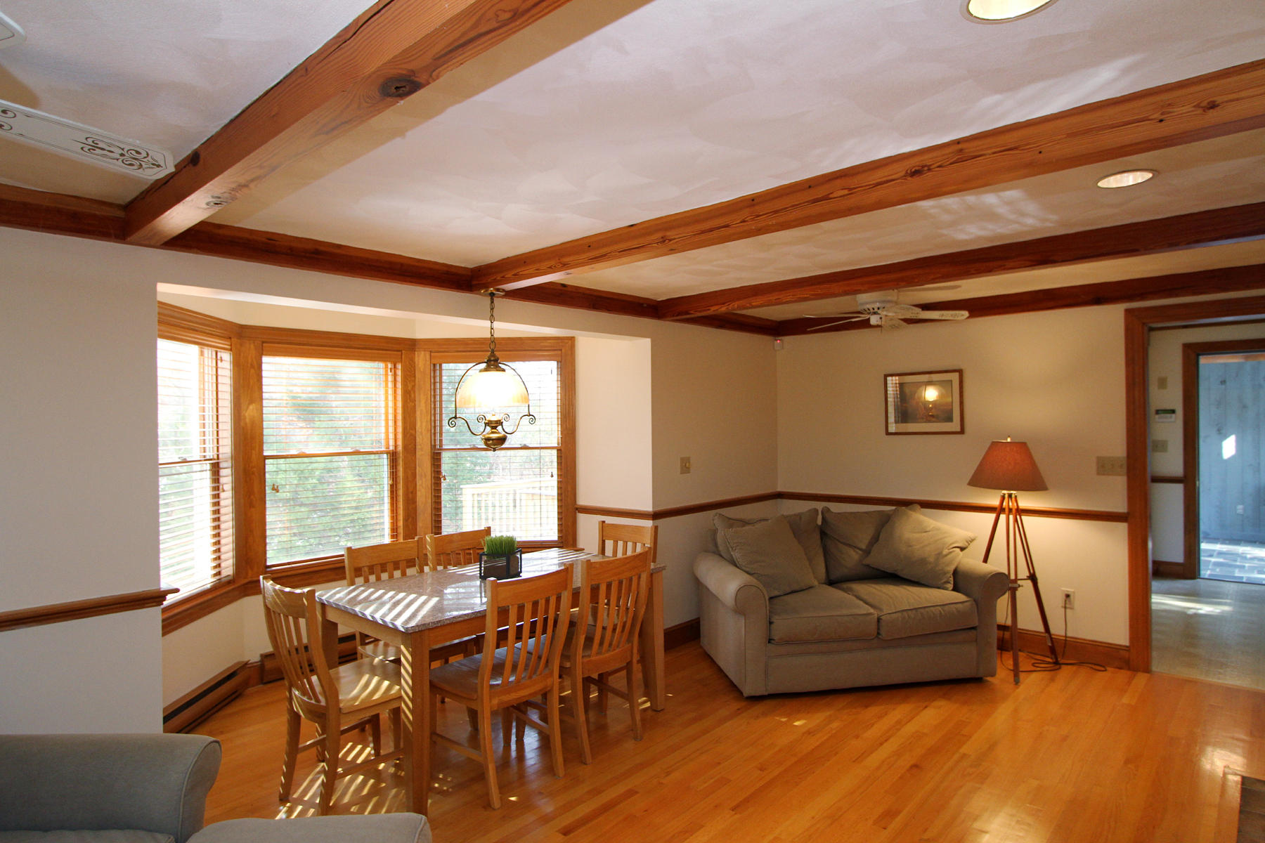 45 Doane Road Harwich Port, MA 02646 - Photo 9 of 35 a living room with furniture and a large window