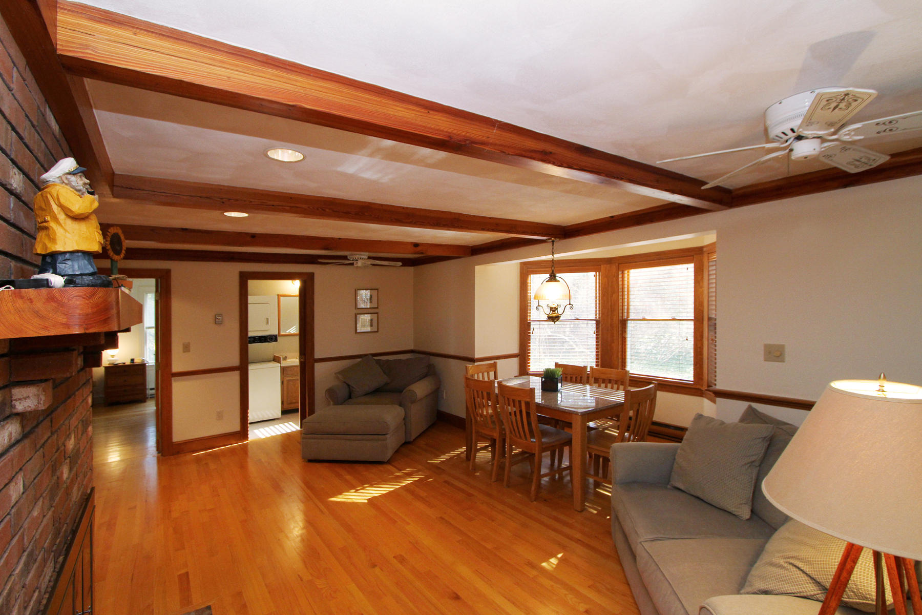 45 Doane Road Harwich Port, MA 02646 - Photo 10 of 35 a living room with furniture and a large window