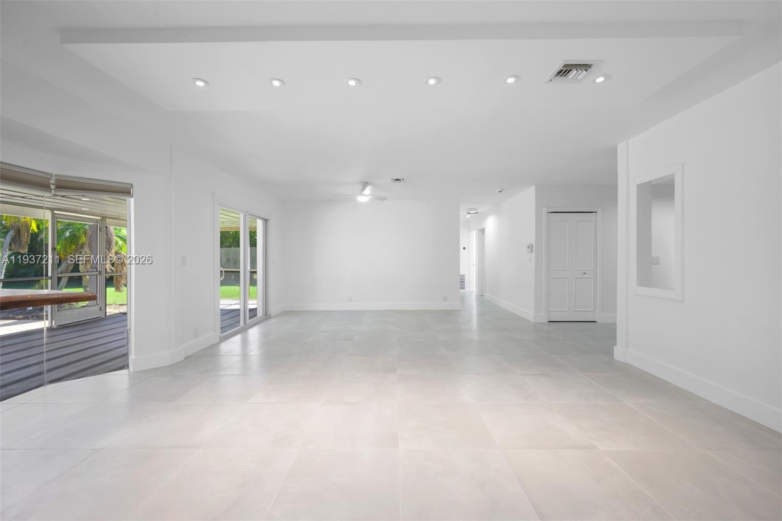 5300 Southwest 162nd Avenue Southwest Ranches, FL 33331 - Photo 13 of 43 an empty room with windows and entrance