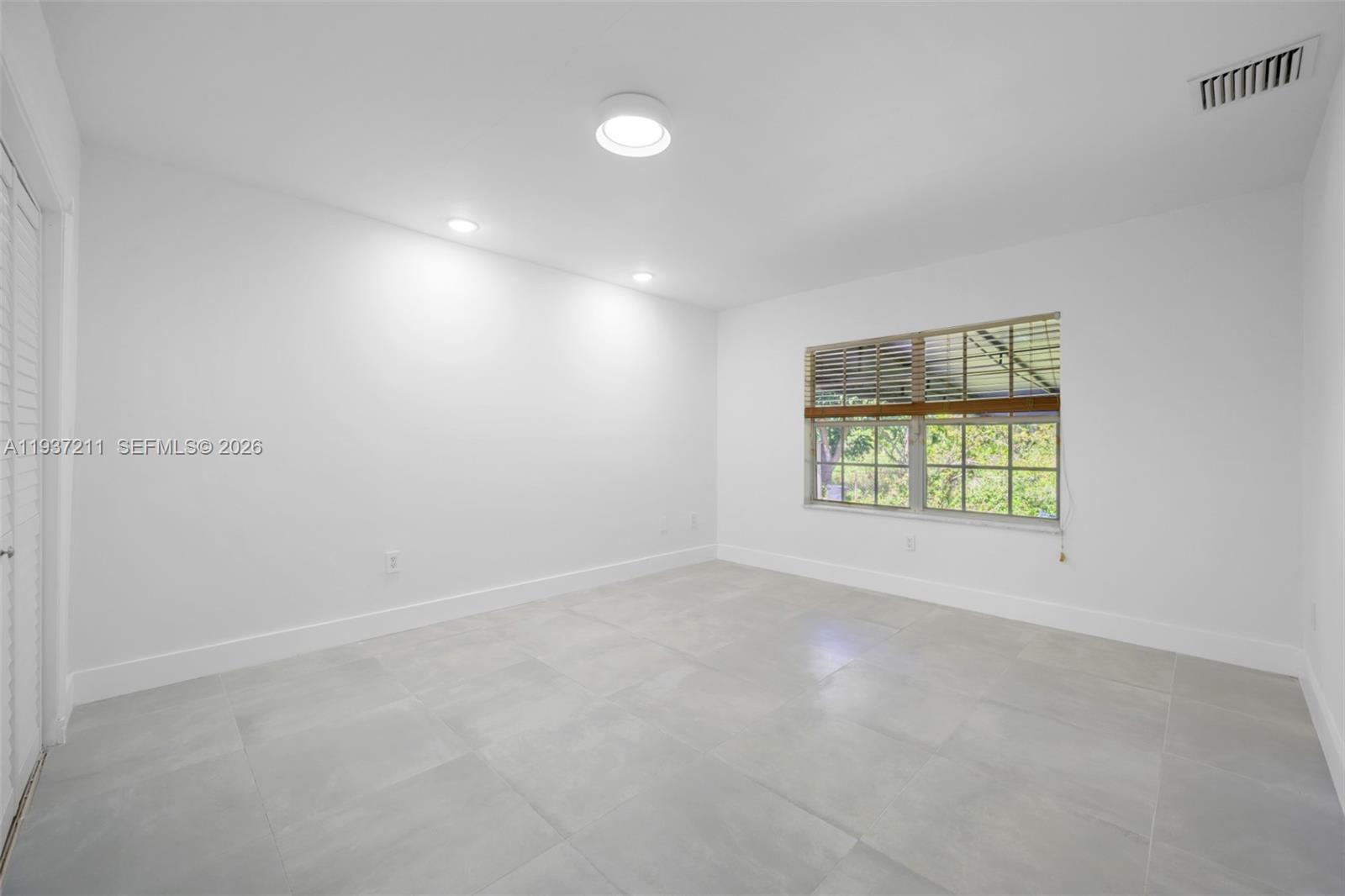 5300 Southwest 162nd Avenue Southwest Ranches, FL 33331 - Photo 20 of 43 an empty room with a window