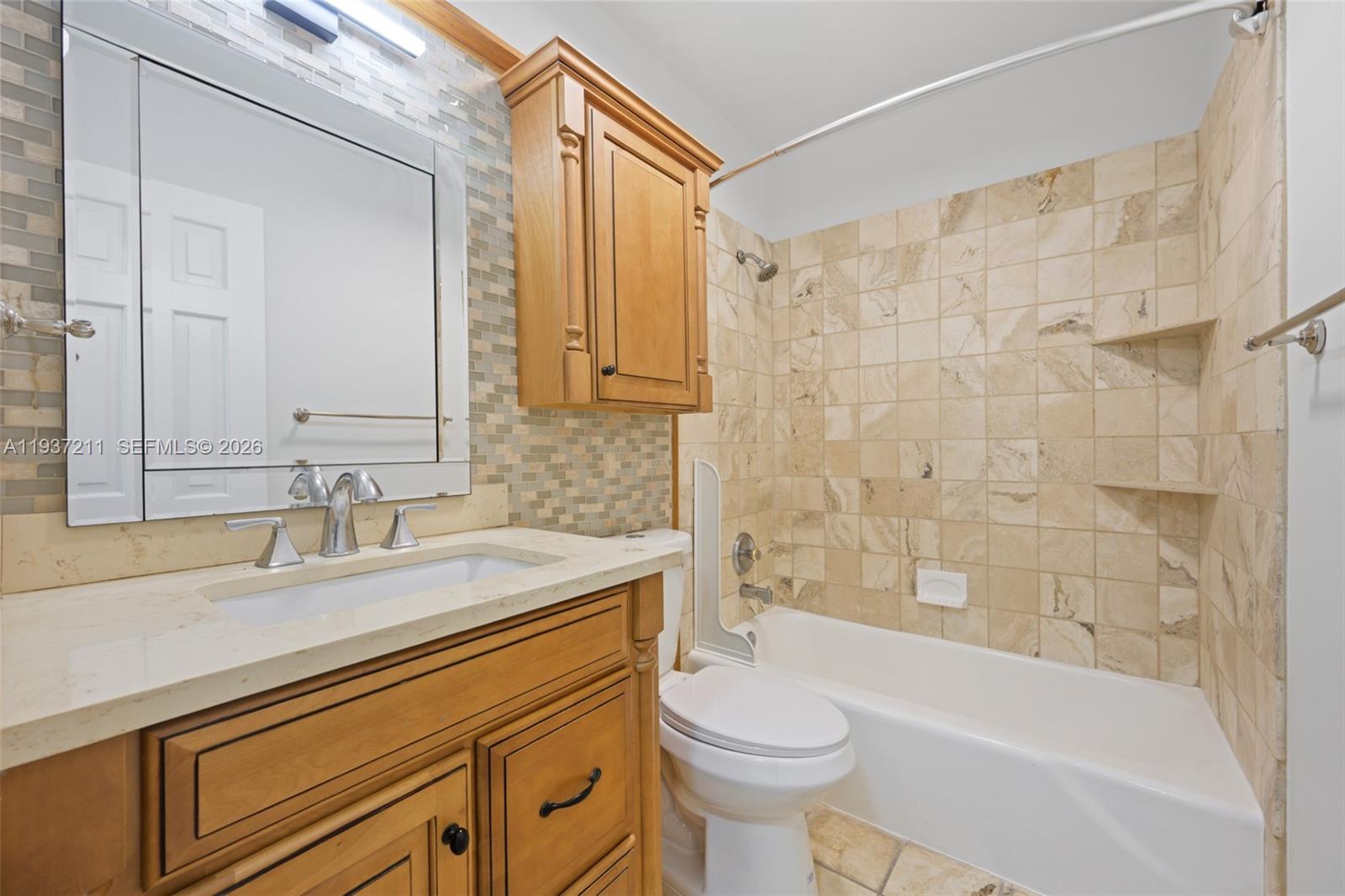 5300 Southwest 162nd Avenue Southwest Ranches, FL 33331 - Photo 29 of 43 a bathroom with a sink a toilet and a bathtub