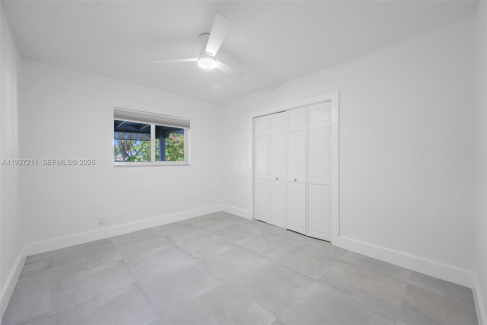 5300 Southwest 162nd Avenue Southwest Ranches, FL 33331 - Photo 30 of 43 an empty room with a window
