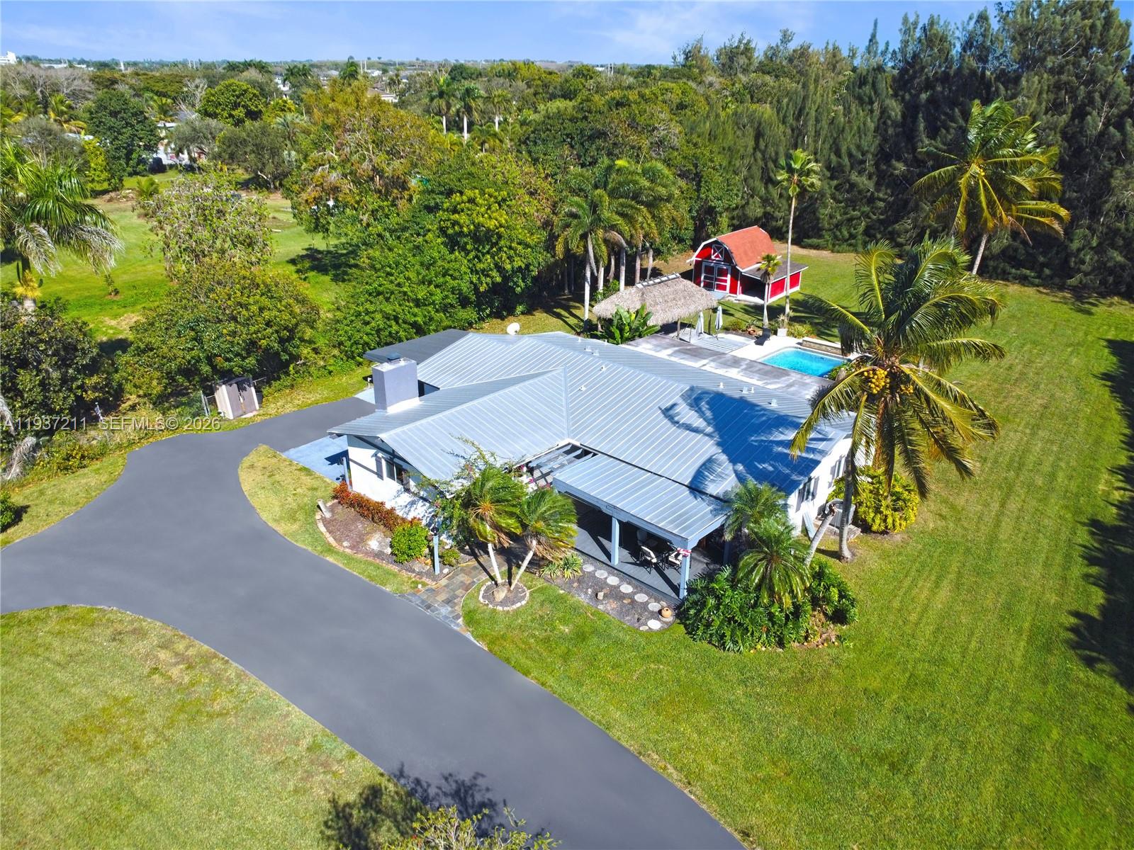 5300 Southwest 162nd Avenue Southwest Ranches, FL 33331 - Photo 39 of 43 an aerial view of a house with a yard basket ball court and outdoor seating