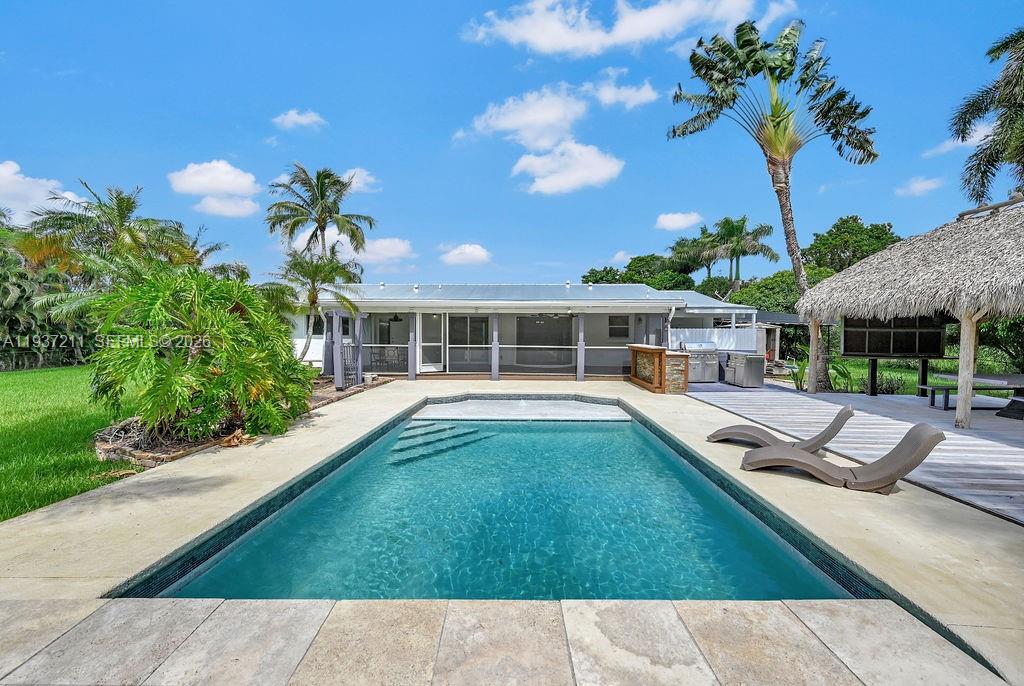 5300 Southwest 162nd Avenue Southwest Ranches, FL 33331 - Photo 8 of 43 a view of house with swimming pool outdoor seating