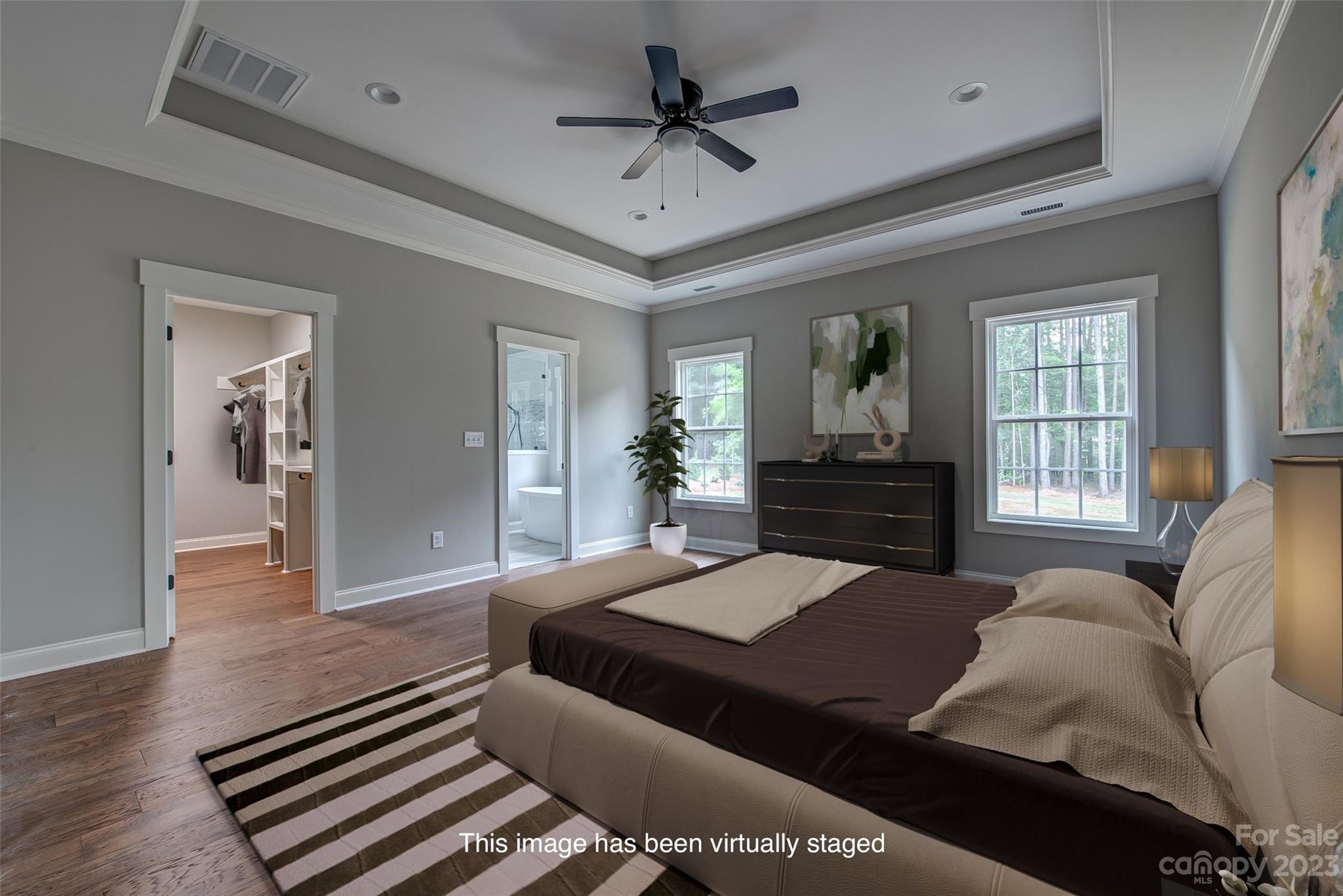 2911 Sparrow Springs Road Gastonia, NC 28052 - Photo 17 of 31 a bedroom with a bed and glass walk in closet