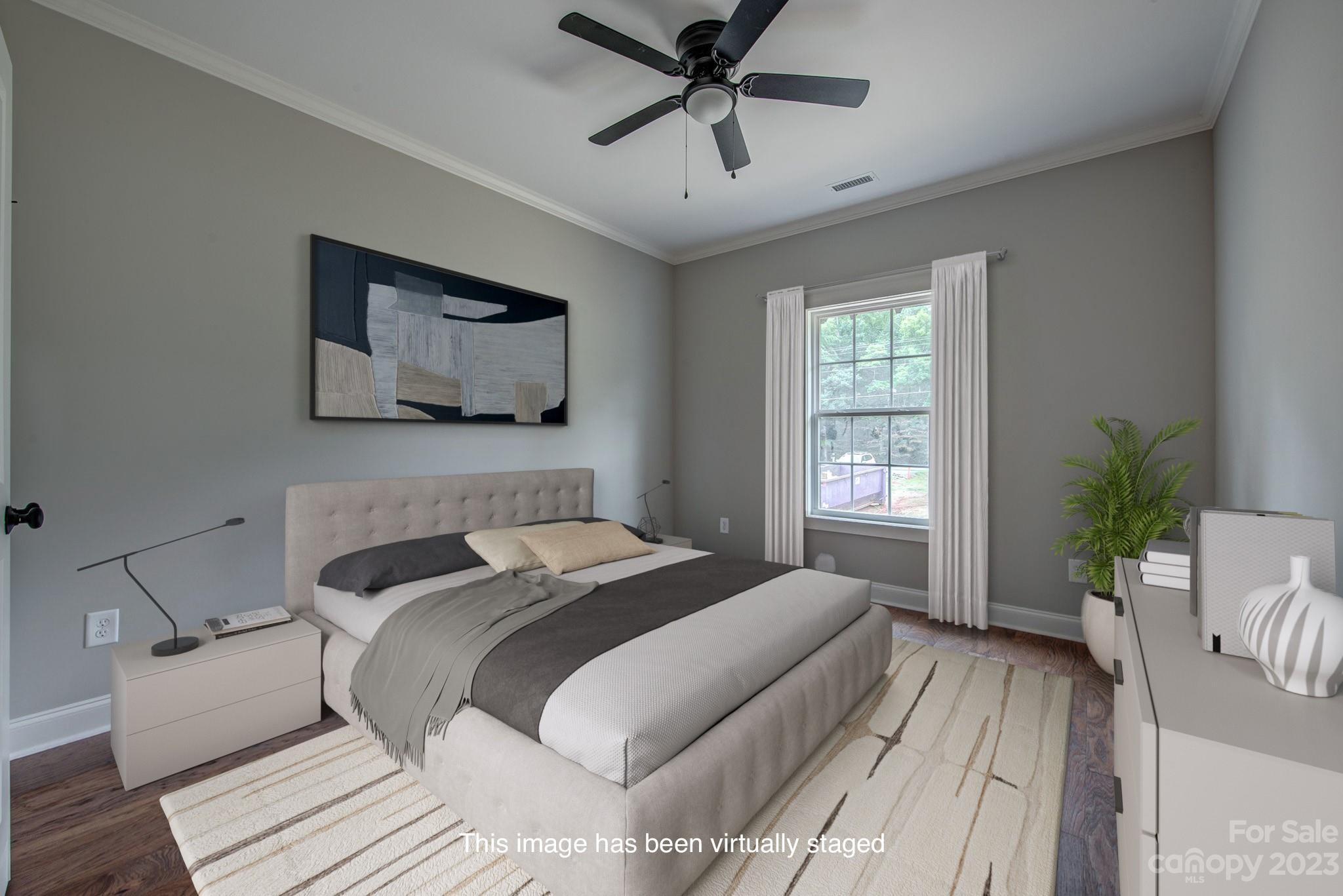 2911 Sparrow Springs Road Gastonia, NC 28052 - Photo 23 of 31 a bedroom with a bed and a potted plant
