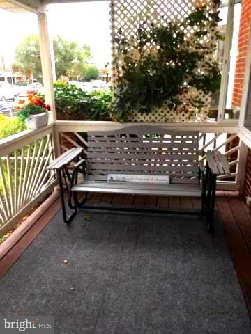 1919 Marsdale Road Baltimore, MD 21222 - Photo 3 of 27 a view of a bench in the roof deck