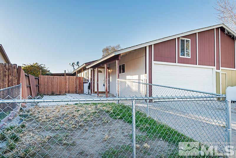 1379 Butler Street Reno, NV 89512 - Photo 1 of 1 a backyard of a house with lots of green space