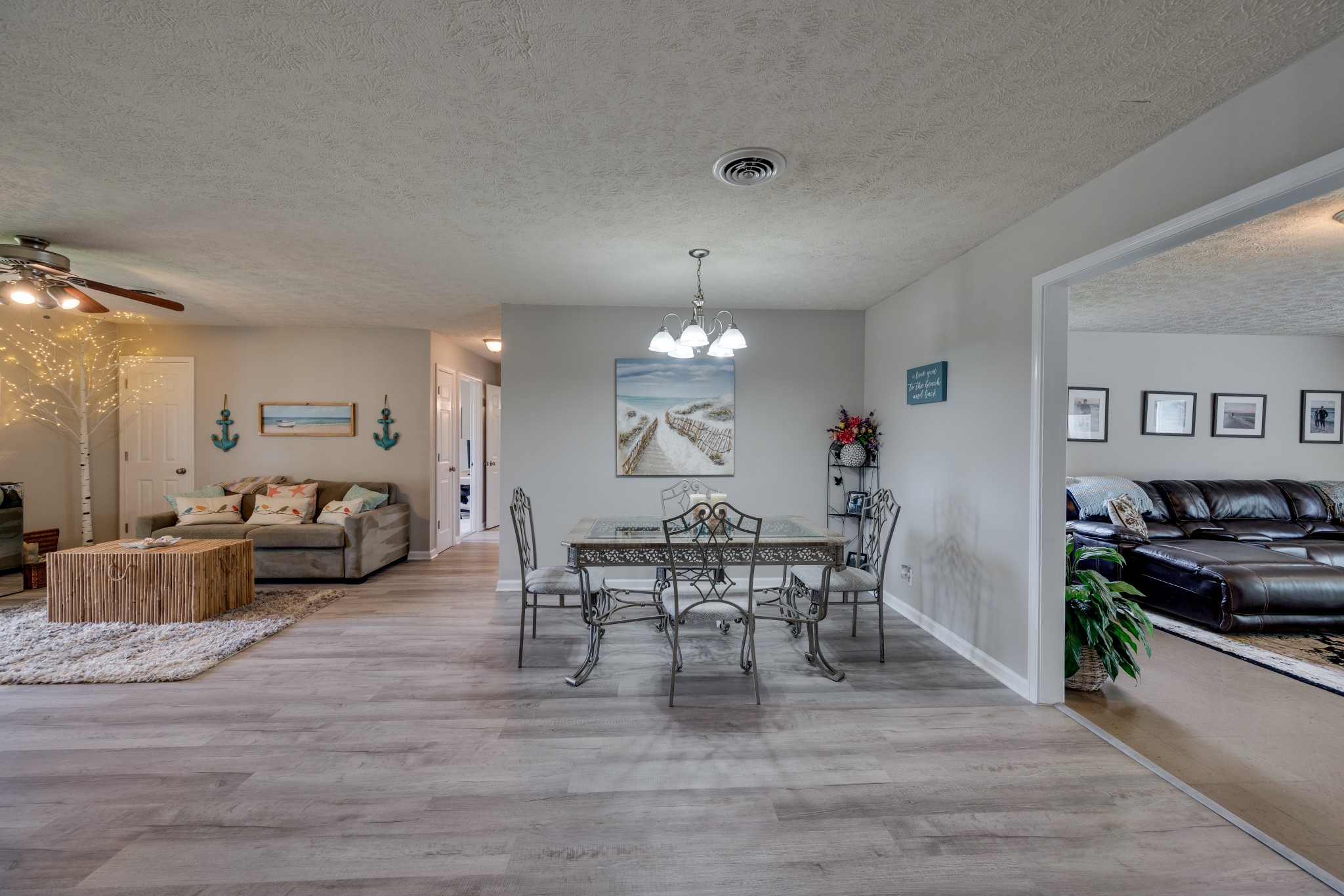 211 Westwind Drive Springfield, TN 37172 - Photo 13 of 33 a view of a dining room with furniture and wooden floor
