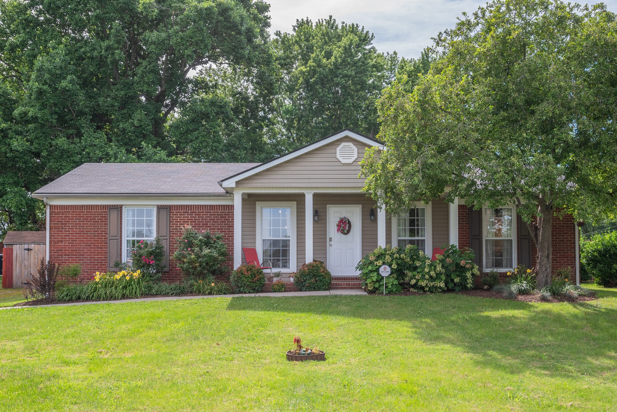 211 Westwind Drive Springfield, TN 37172 - Photo 2 of 33 a front view of a house with garden