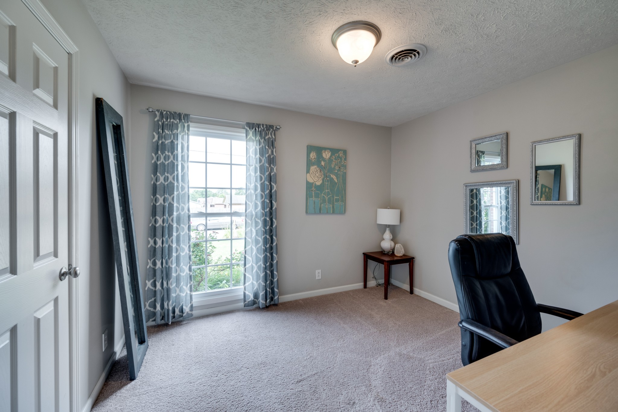 211 Westwind Drive Springfield, TN 37172 - Photo 22 of 33 a view of a livingroom with furniture and a window