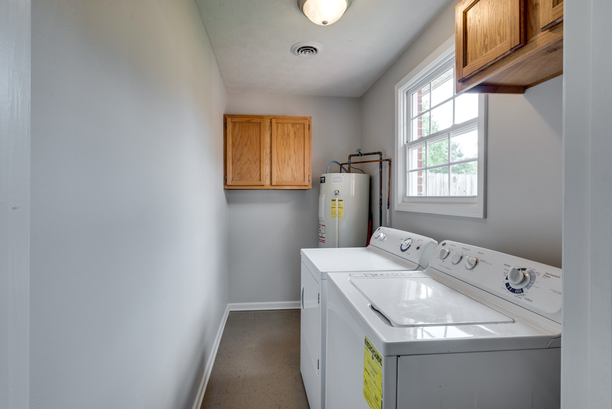 211 Westwind Drive Springfield, TN 37172 - Photo 29 of 33 a utility room with dryer and washer
