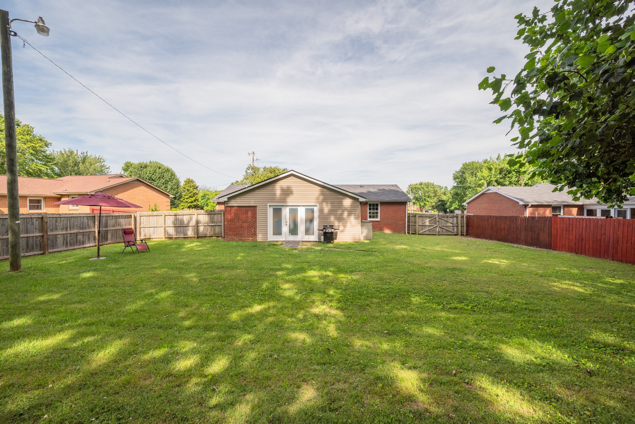 211 Westwind Drive Springfield, TN 37172 - Photo 31 of 33 a front view of house with yard and green space