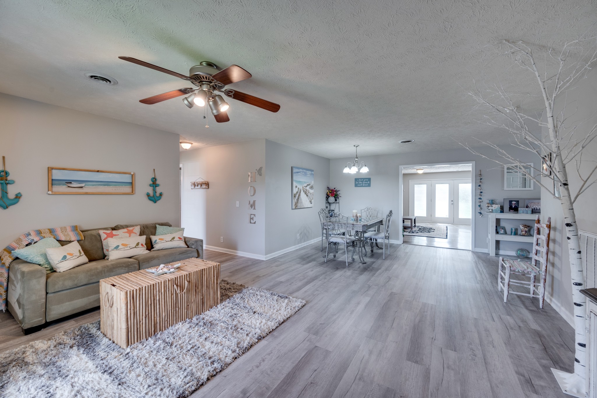 211 Westwind Drive Springfield, TN 37172 - Photo 5 of 33 a living room with furniture and wooden floors